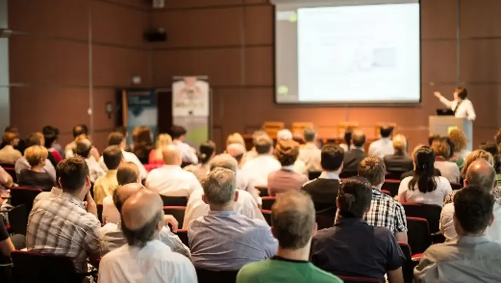 Audience attending a scientific presentation at a congress